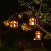 Solar Hanging Lantern With Glass Panels And LED Candle For Outdoor Decor Lighting On Patios And Gardens
