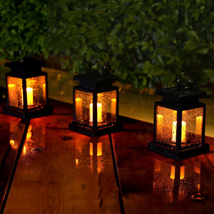 Solar Hanging Lantern With Glass Panels And LED Candle For Outdoor Decor Lighting On Patios And Gardens