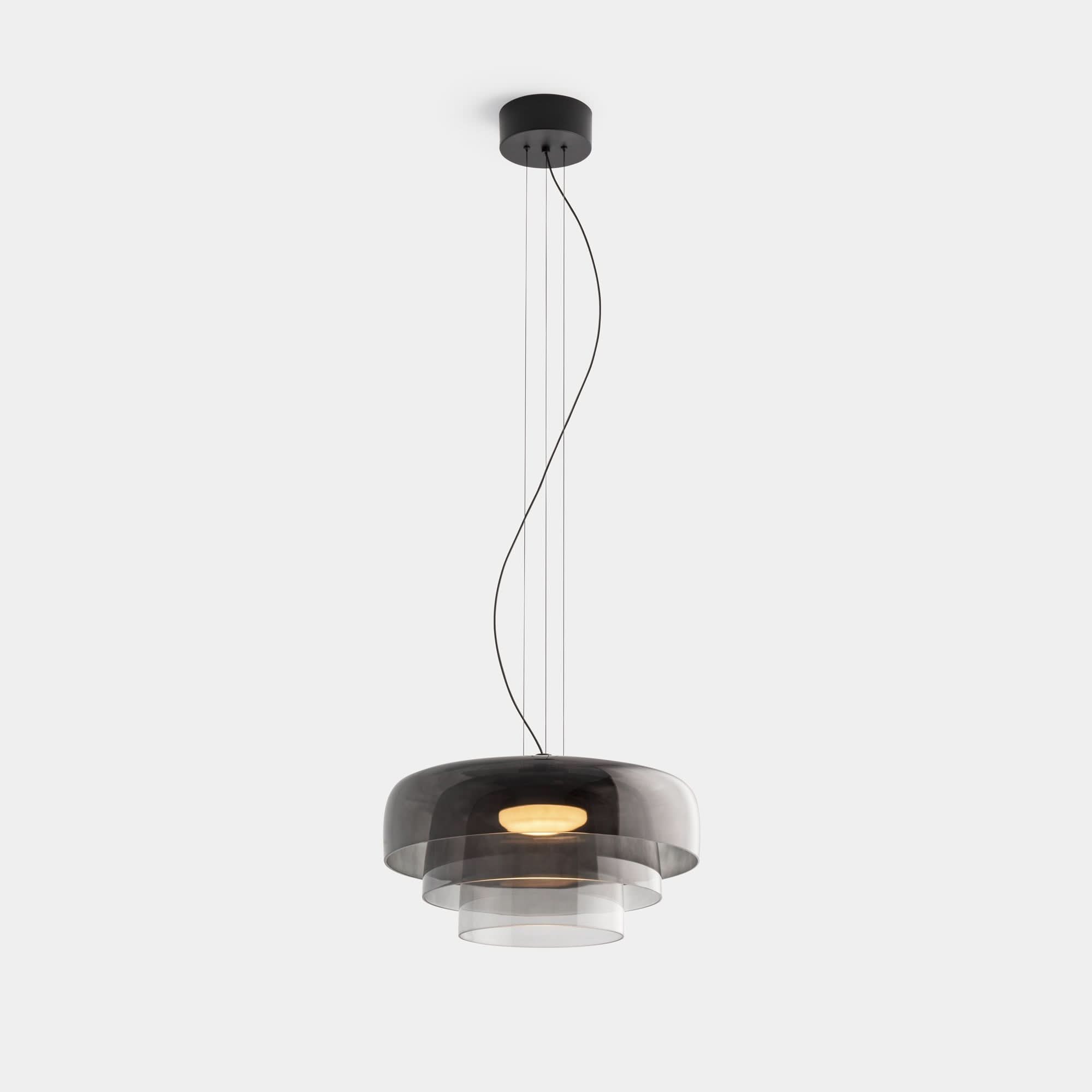 Aurora glasophængt lampe med unikt metal- og glasvedhængsdesign til moderne interiører