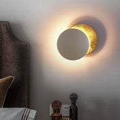 Solar Eclipse Inspired Wall Lamp With Warm Led Light And Two Golden Discs, One Fixed And One Rotatable