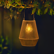 Solar LED Garden Lantern With A Woven Frame And Integrated Light For Outdoor Use And Patio Decor