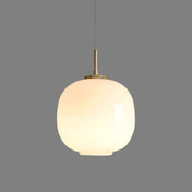Opaline glaspendel med nordisk lanterndesign til varme, minimalistiske interiører og blid stemning