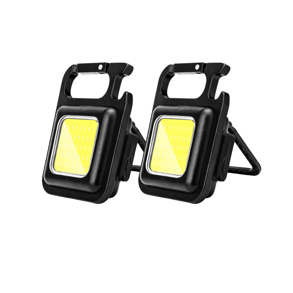 Luz de trabajo compacta impermeable recargable por USB BrightTrail para camping, reparaciones y tareas al aire libre