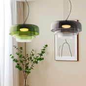 Aurora glasophængt lampe med unikt metal- og glasvedhængsdesign til moderne interiører