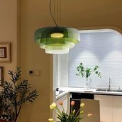 Aurora glasophængt lampe med unikt metal- og glasvedhængsdesign til moderne interiører